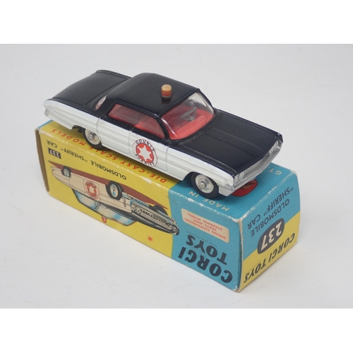 1330 - A boxed Corgi Toys No.237 Oldsmobile Sheriff Car