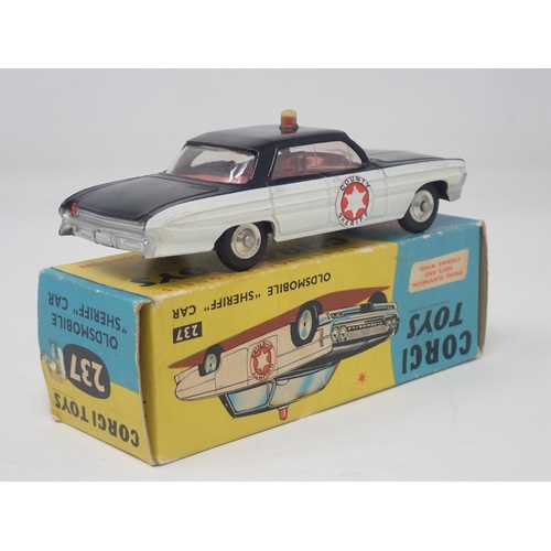 1330 - A boxed Corgi Toys No.237 Oldsmobile Sheriff Car