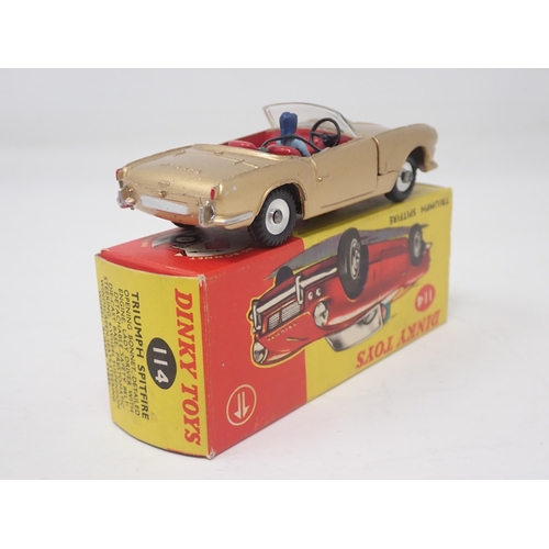 1334 - A boxed Dinky Toys No.114 gold Triumph Spitfire