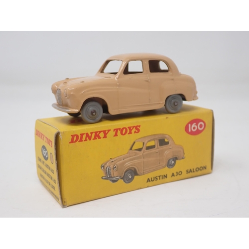 1335 - A boxed Dinky Toys No.160 tan Austin A30 Saloon