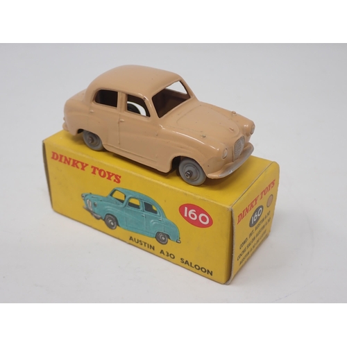 1335 - A boxed Dinky Toys No.160 tan Austin A30 Saloon