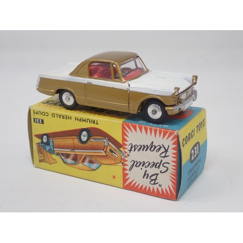 1351 - A boxed Corgi Toys No.231 gold and white Triumph Herald Coupe