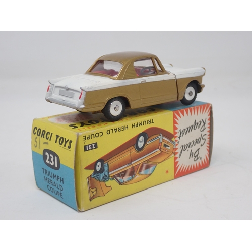 1351 - A boxed Corgi Toys No.231 gold and white Triumph Herald Coupe