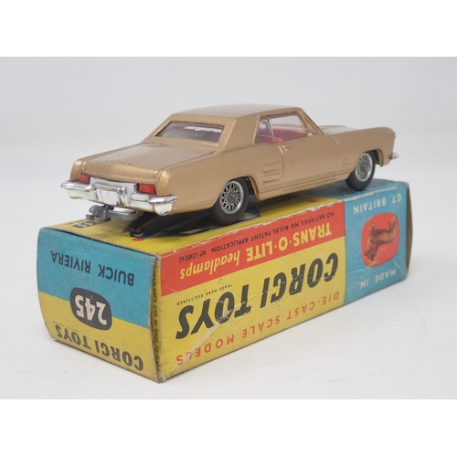 1354 - A boxed Corgi Toys No.245 gold Buick Riviera