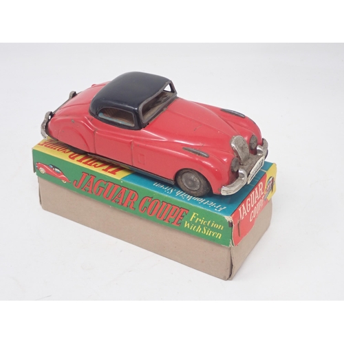 1481 - A boxed Japanese tinplate friction Jaguar Coupe and an unboxed Startex Sunbeam Alpine A/F