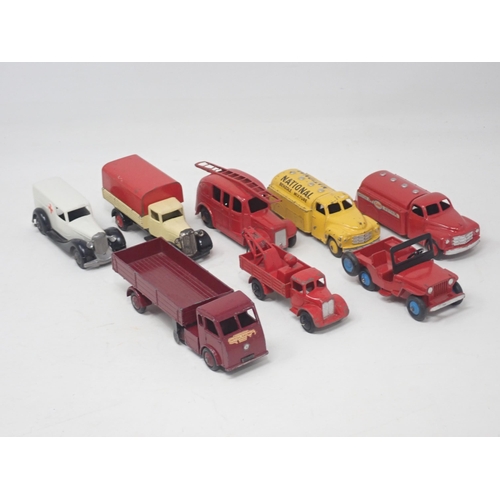 1488 - Eight unboxed Dinky Toys including National Benzole Tanker, Esso Tanker, Jeep, etc., some repainted