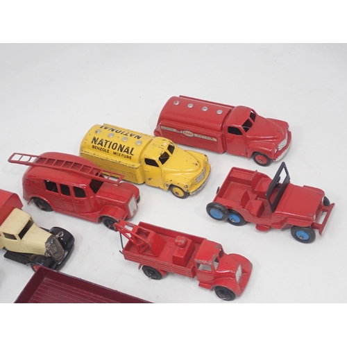 1488 - Eight unboxed Dinky Toys including National Benzole Tanker, Esso Tanker, Jeep, etc., some repainted