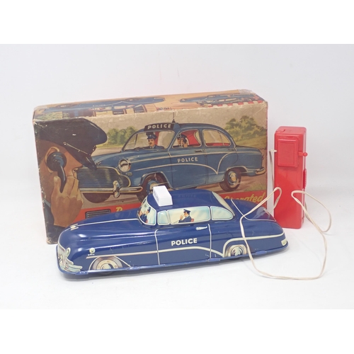 1490 - A boxed Welsotoys remote control battery operated Police Car