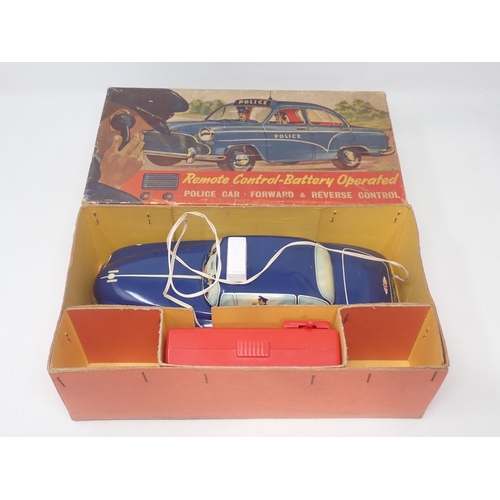 1490 - A boxed Welsotoys remote control battery operated Police Car