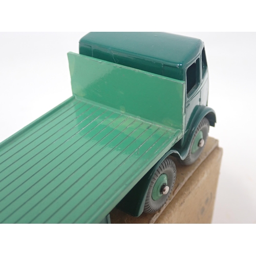 1492 - A boxed Dinky Toys No.503 1st type two tone green Foden Flat Truck with tailboard