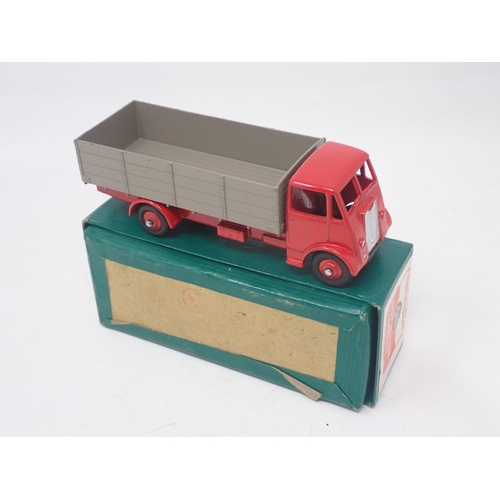 1494 - A boxed Dinky Toys No.511 Guy 1st type Lorry with red cab and chassis and fawn back