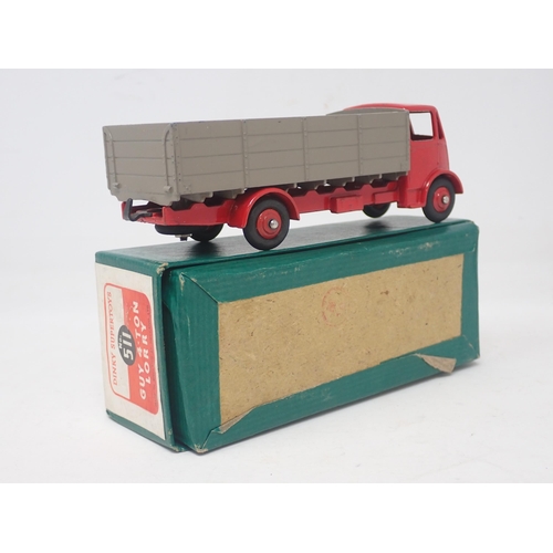 1494 - A boxed Dinky Toys No.511 Guy 1st type Lorry with red cab and chassis and fawn back