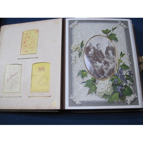 407 - A late 19th Century family Photo Album incorporating a Music Box, the album bound in padded leather ... 