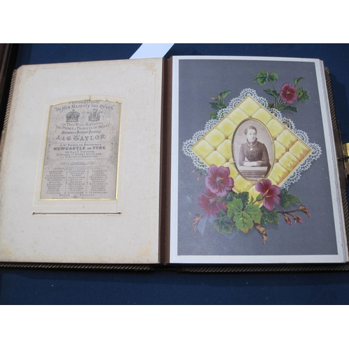 407 - A late 19th Century family Photo Album incorporating a Music Box, the album bound in padded leather ... 