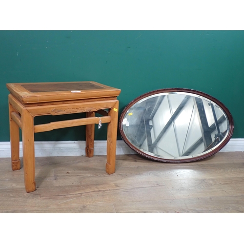608 - A Chinese mixed wood Occasional Table 1ft 8in W x 1ft 7in H and an oval mahogany framed Wall Mirror