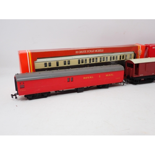 1650 - An unboxed Hornby 00 gauge 'Flying Scotsman', three LNER teak Coaches, Triang Diesel Locomotive, 0-6... 