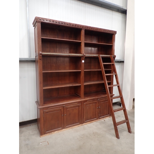 1 - A reproduction oak three section Library Bookcase & Ladder the top sections fitted with shelves, abo... 