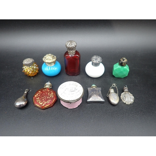 126 - Six small coloured glass Scent Bottles, four others and a Georgian circular enamel Patch Box, 'I'll ... 
