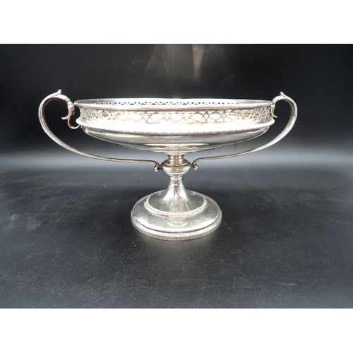 130 - A George V silver two handled Comport with pierced and beaded gallery on pedestal base, London 1915,... 