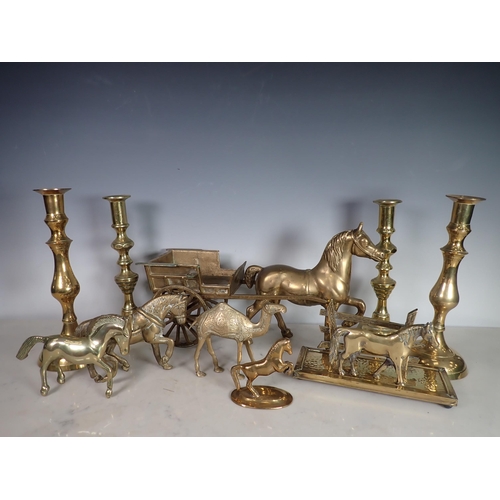 146 - A box of Brassware including two pairs of Candlesticks, a Horse Drawn Cart, a Letter Rack, three Hor... 