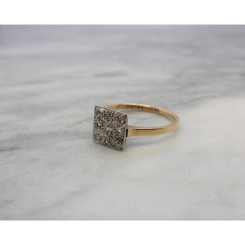 169 - An early 20th Century square Diamond Cluster Ring millegrain-set nine eight-cut stones, marked 18ct/... 