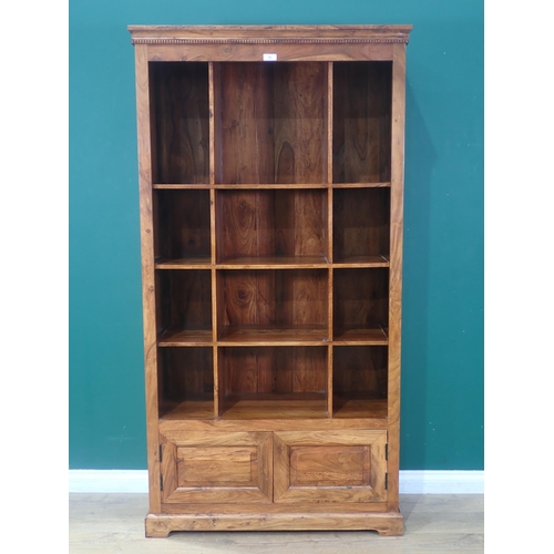 18 - A modern hardwood Bookcase, the bottom fitted with pair of panelled doors, 6ft 4