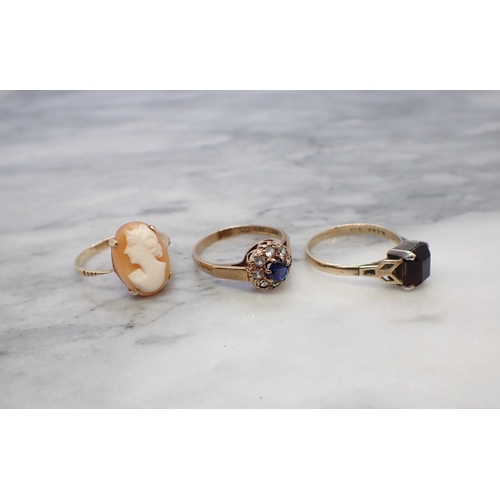 194 - A carved shell Cameo Ring stamped 9ct, a 9ct gold Cluster Ring claw-set blue and white synthetic sto... 