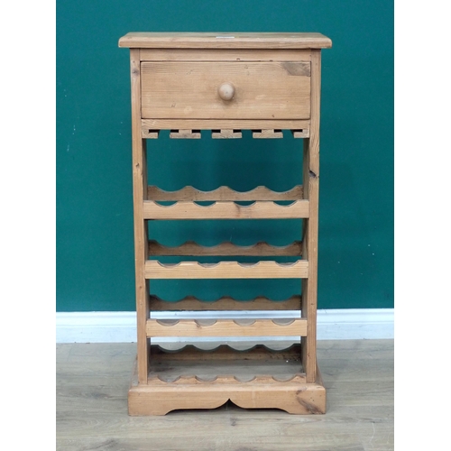 21 - A modern pine sixteen Bottle Wine Rack with single fitted drawer above, 3ft 4