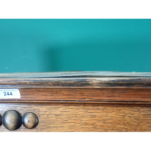 244 - A reproduction oak glazed Standing Corner Cupboard, the glazed top section above pair of panelled do... 