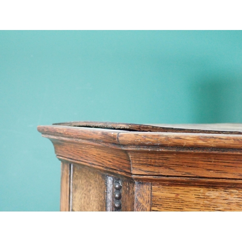 244 - A reproduction oak glazed Standing Corner Cupboard, the glazed top section above pair of panelled do... 