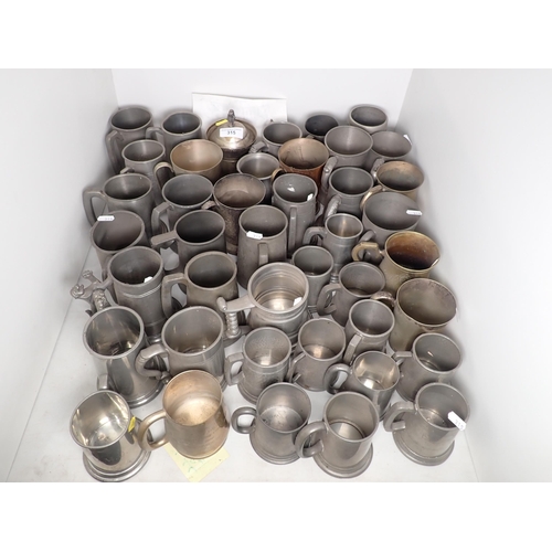 315 - A large quantity of pewter Tankards