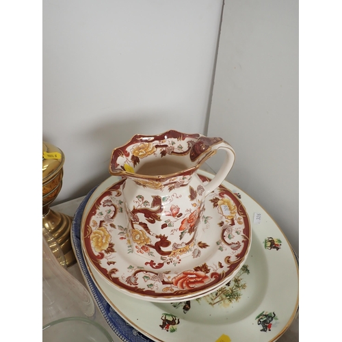 326 - A set of three Masons Ironstone 'Brown Velvet' Jugs, and two matching Plates, a brass Paraffin Lamp,... 