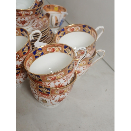 329 - A Royal Stuart part Tea Set, two Wade lustre Jugs, etc