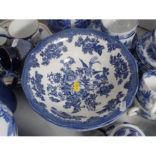 335 - A quantity of blue and white ware including Bowls, Teapot, Cups and Saucers, etc