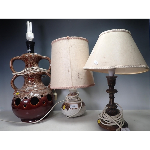 350 - Two pottery Table Lamps and a carved wooden Table Lamp, failed PAT