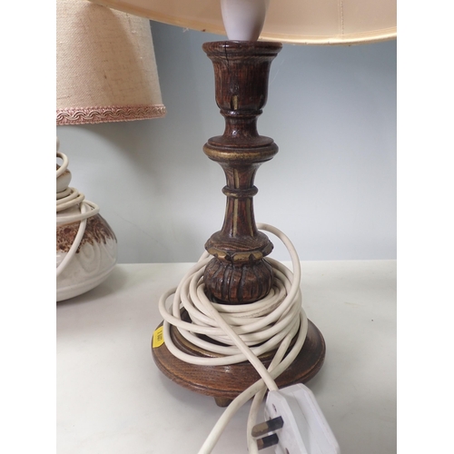 350 - Two pottery Table Lamps and a carved wooden Table Lamp, failed PAT