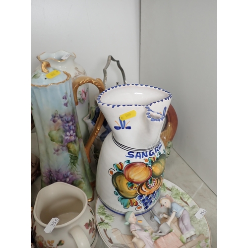 356 - A quantity of porcelain and pottery including fish Jugs, Candelabra, a Teapot, a Biscuit Barrel, etc