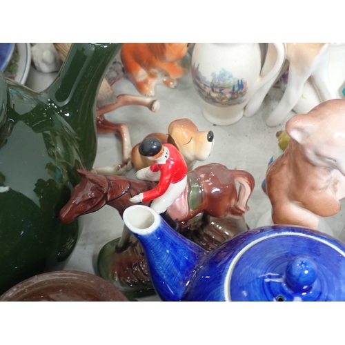 357 - A quantity of Figurines including birds, children, also Teapots, etc