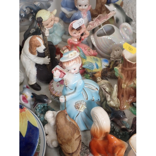 357 - A quantity of Figurines including birds, children, also Teapots, etc