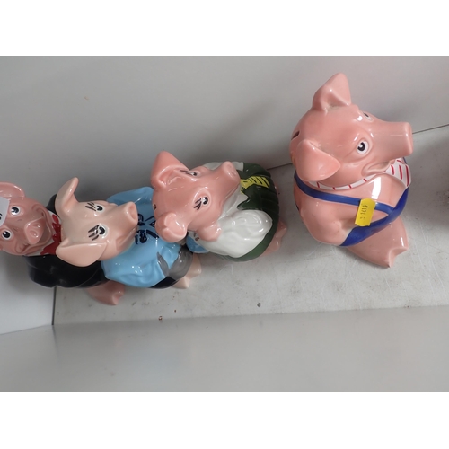 387 - A set of five Wade Nat West Piggy Banks