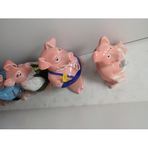 387 - A set of five Wade Nat West Piggy Banks