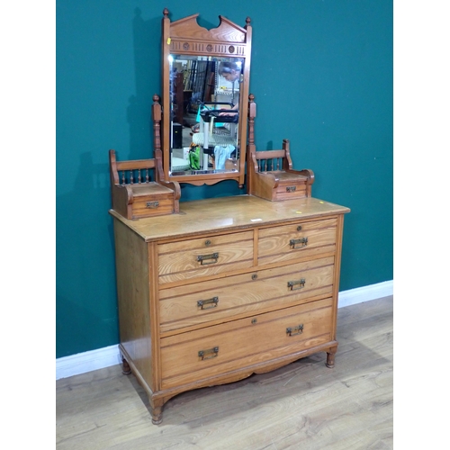 44 - A 19th Century Ash mirror back Dressing Chest flanked by two drawers, above two short, two long draw... 