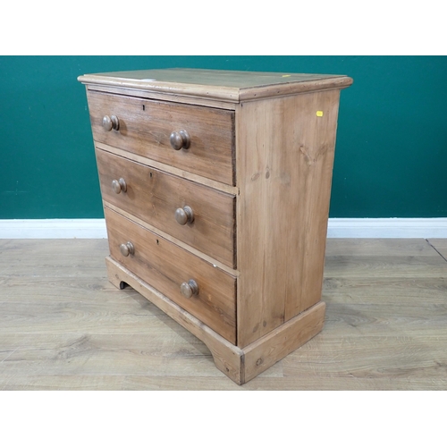 471 - A pine Chest of three long drawers on bracket supports, 2ft 7in W