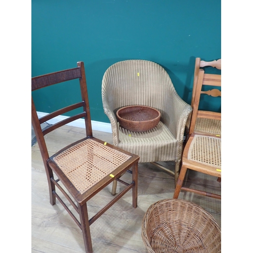 486 - Five cane-seated Bedroom Chairs, a Lloyd Loom Armchair, a cane Armchair, a cat Basket, a Picnic Bask... 