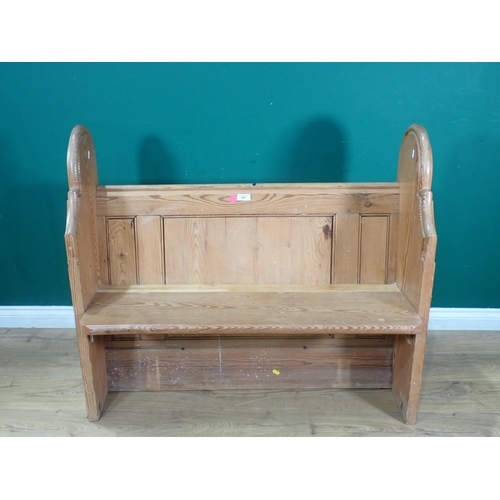 501 - A small pitch pine Pew with arched and moulded side supports, 3ft 8in W