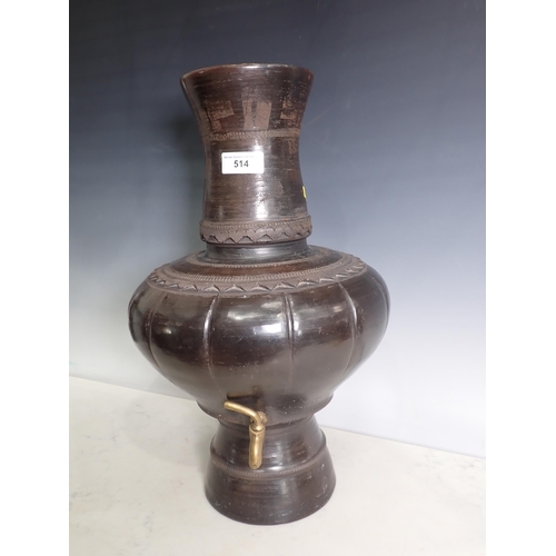 514 - A brown pottery Urn and Cover with incised decoration and brass tap, 1ft 11in H