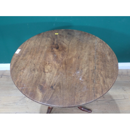 517 - A 19th Century mahogany tilt-top Table with turned column and tripod base, 2ft 5in diam