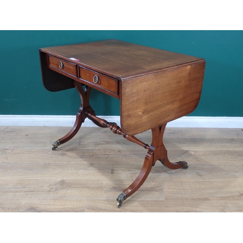 521 - A 19th Century mahogany Sofa Table fitted two frieze drawers on cheval base and turned connecting st... 