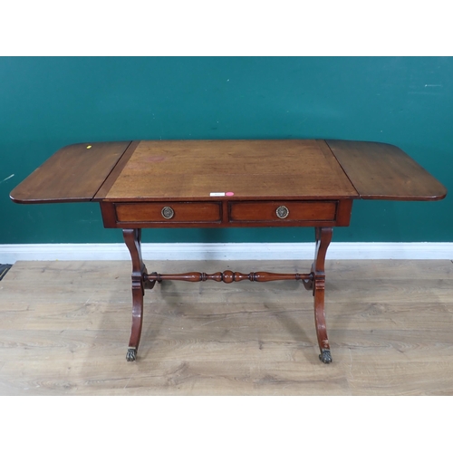 521 - A 19th Century mahogany Sofa Table fitted two frieze drawers on cheval base and turned connecting st... 