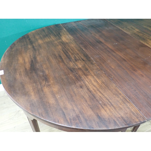 524 - A 19th Century mahogany D-End Dining Table (One spare leaf) on tapered supports, 5ft 10